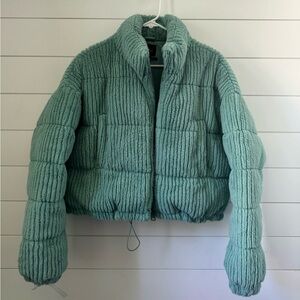 Urban Outfitters Green puffer coat.